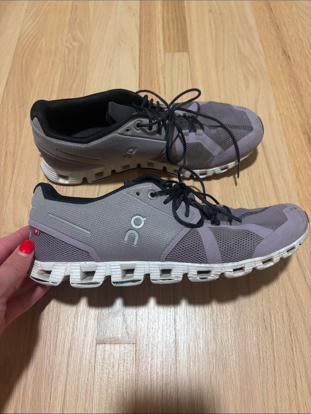 On Running women’s Athletic Shoes in purple and black